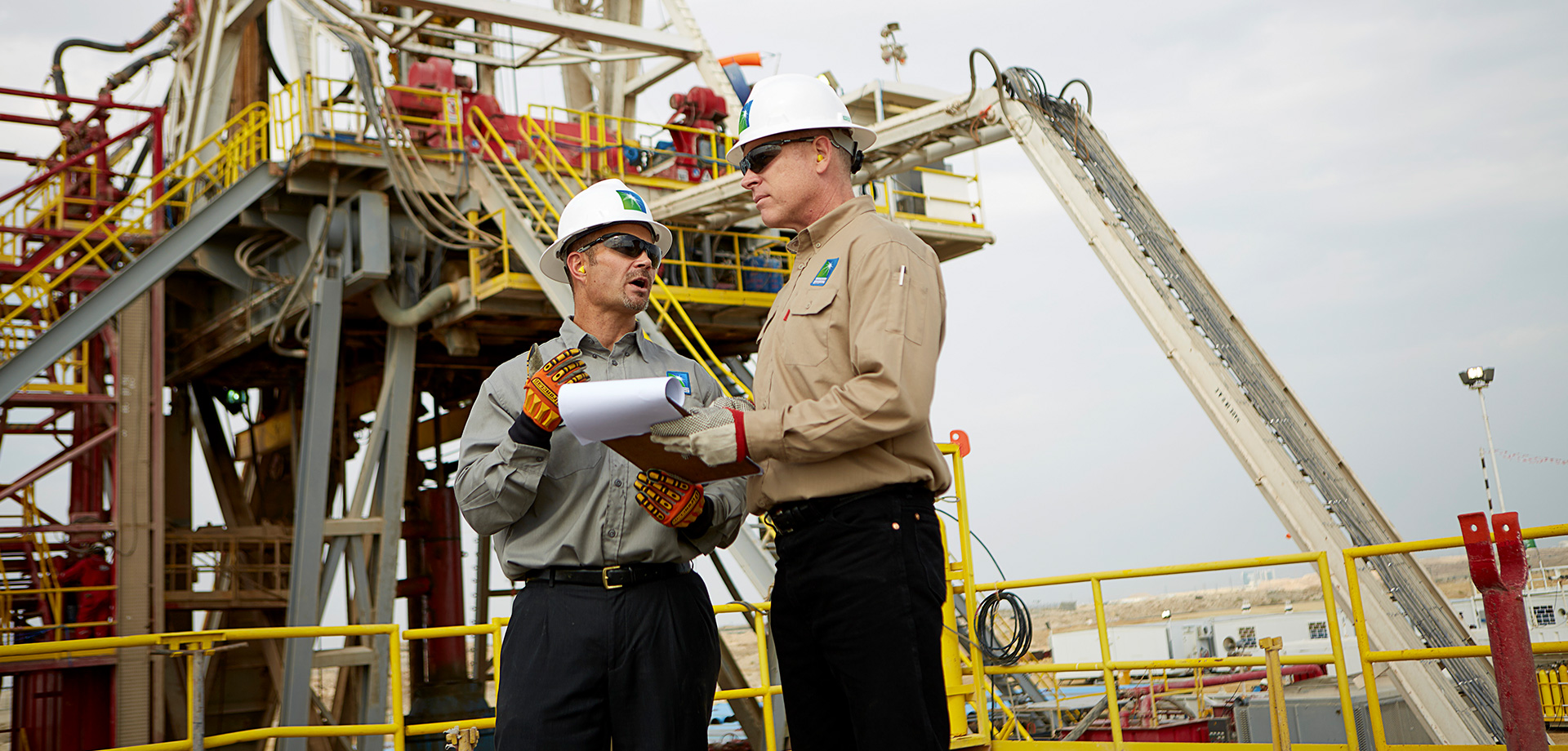 Two workers in the field